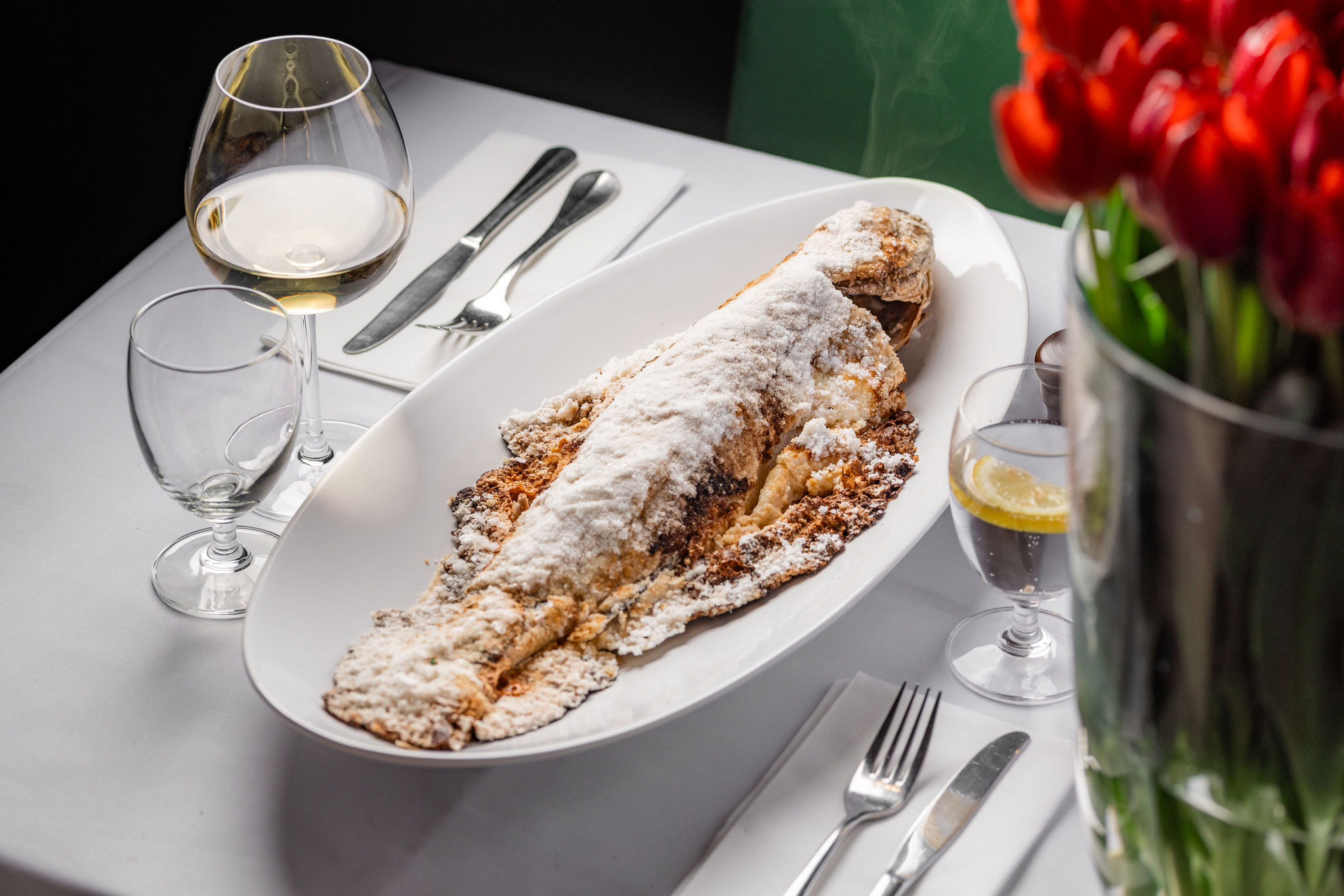 Salt-baked whole fish